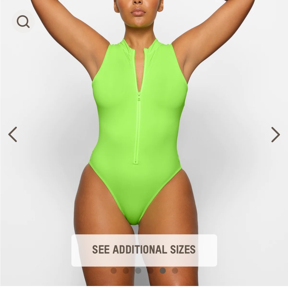 SWIM ZIP FRONT SLEEVELESS ONE PIECE. Size Large. Brand new!!!